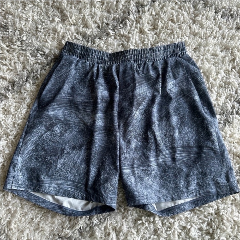 Lululemon Channel Cross Swim Short *7" Fjord
Tempest Blue Multi. Size large.